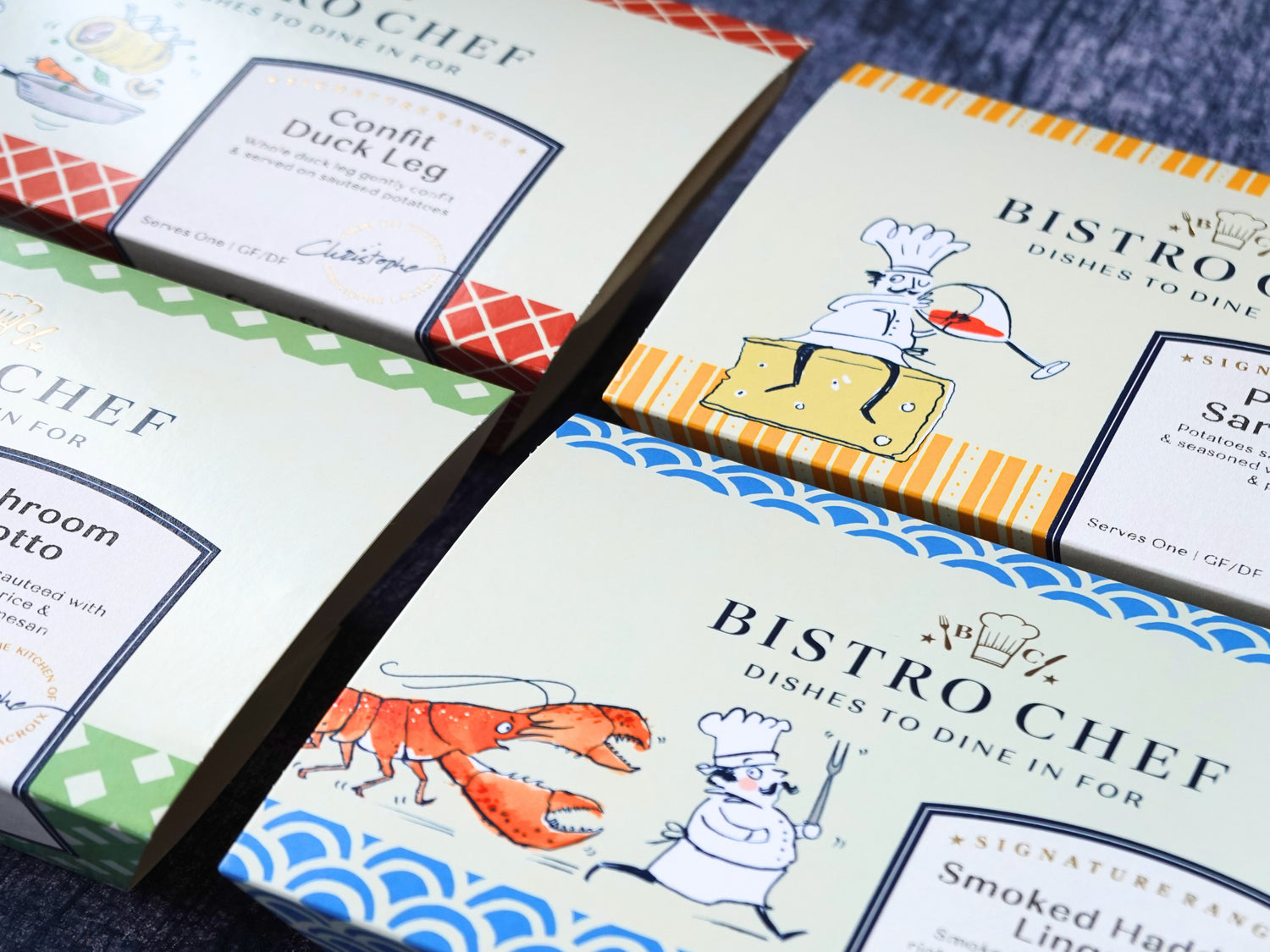Bistro Chef food packaging with illustrations of dishes on a blue surface